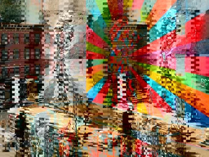 Hidden Rooftop Murals Transform Urban Skyline Into Open-Air Art Gallery